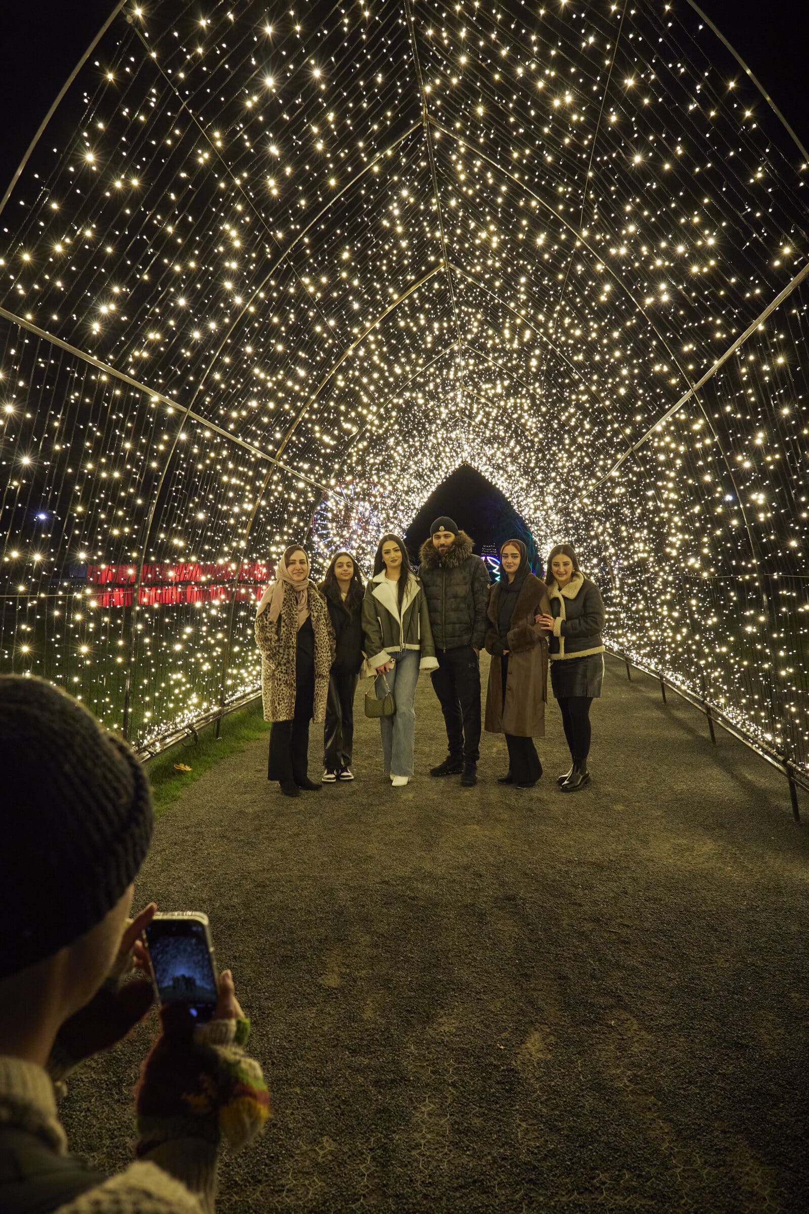 Winter Glow, Three Counties Showground Family enjoying light trail (wideshot)